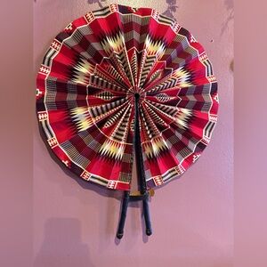 Vibrant Red and Black Decorative Fan